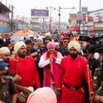 पुष्प वर्षा के साथ नगर परिक्रमा में गूंजे श्री गुरु राम राय जी महाराज के जयकारे